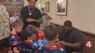 Bills players compete in "Getting Saucy" wing sauce competition