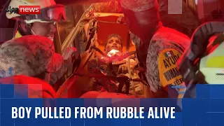 Venezuela earthquakes: 11-year-old boy pulled from rubble alive - as more than 1,400 killed