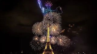 Drones y fuegos artificiales iluminan la Torre Eiffel antes del Día de la Bastilla