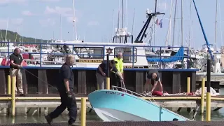 Four rescued after boat capsized in Port Washington | FOX6 News Milwaukee