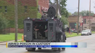 Armed person in custody