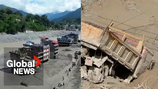 Nepal says it lost nearly 400 people, almost 2,000 more are missing after massive flash flood