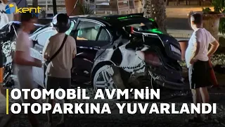 CAR TUMBLED INTO MALL PARKING LOT