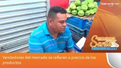 Vendedores del mercado se refieren a precios de los productos Vendedores del mercado se refieren a precios de los productos